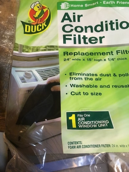 A clear and green plastic Duck brand Air Conditioning Replacement Filter. The package reads Air Conditioner Filter Replacement Filter 24 wide x 15 high x 1/4 thick, Eliminates dust and pollen from the air, Washable and reusable, Cut to Size. 1 Fits One Air Conditioning Window Unit.