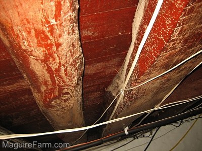 Old Basement Beam with axe marks in the wood
