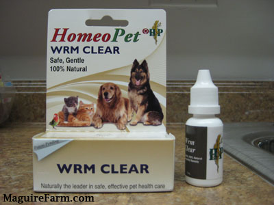 A package of Homeo Pet wormer sitting on a kitchen counter.